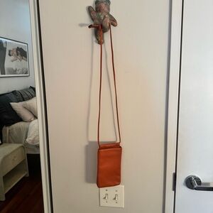 ZARA orange faux leather phone purse